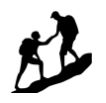 a man helping another man to climb up a hill