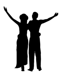 two people standing next to each other with their arms in the air
