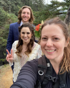 three people taking a selfie in the woods
