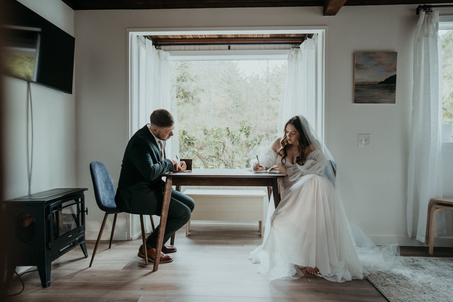 bride and groom write their vows on their wedding day