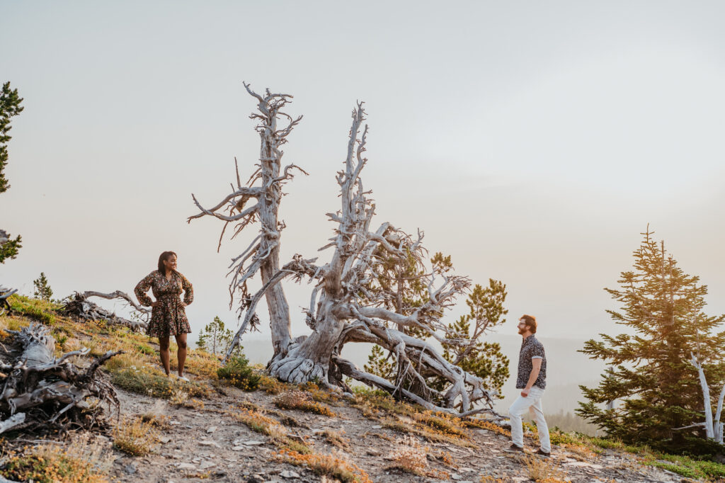 a group of people standing on top of a mountain